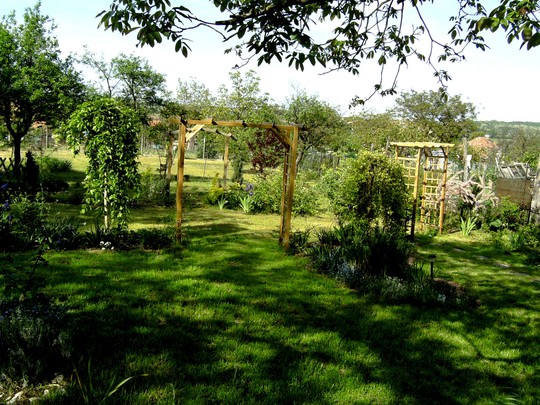 View from top garden looking through middle arch in back garden.